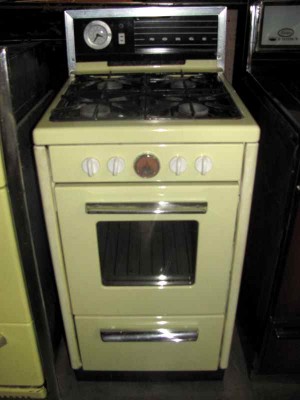 YELLOW STOVE WITH VIEWING WINDOW